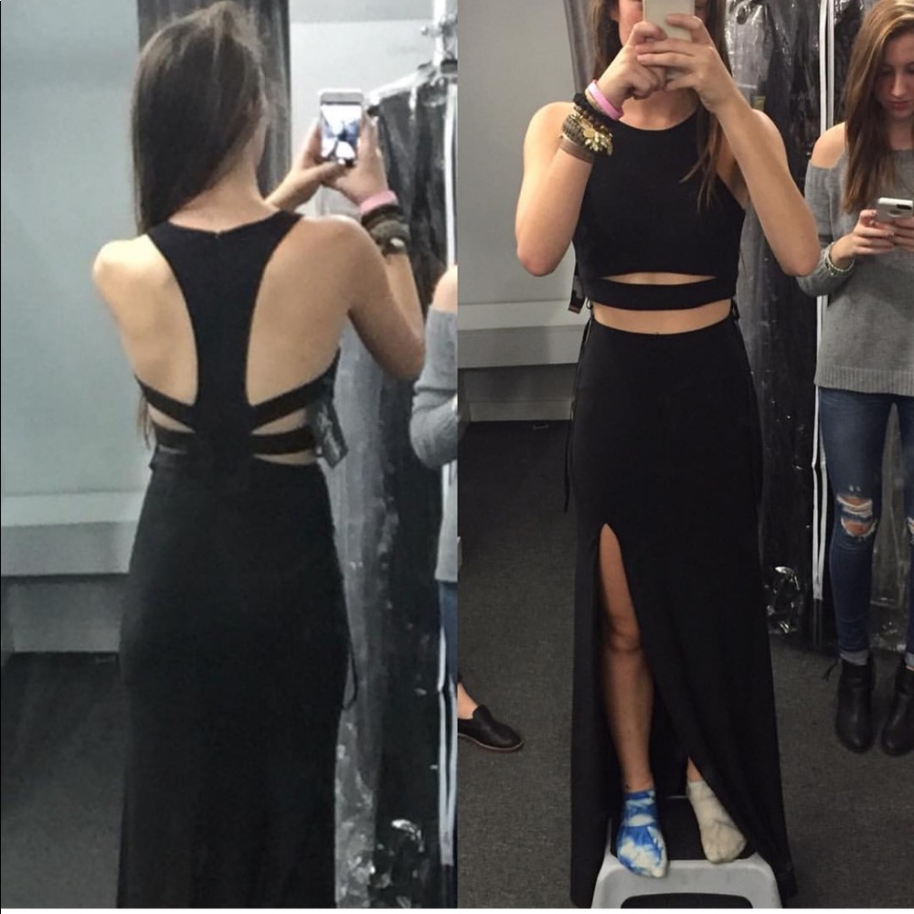 Long black formal dress with cutouts